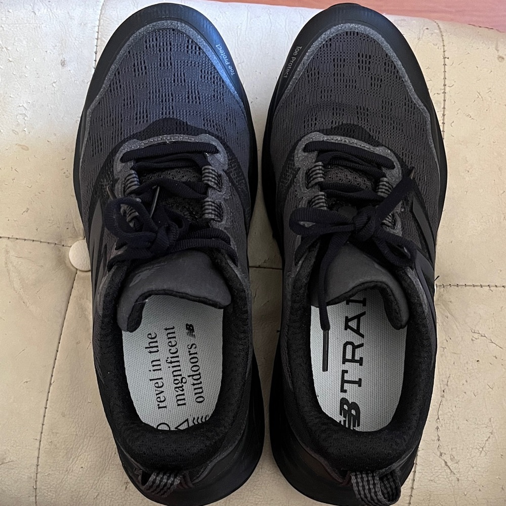 New Balance Charcoal and Black Trainers shoes for women.